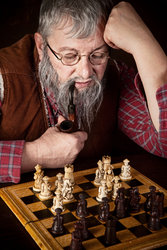 cutcaster-photo-100792852-Old-chess-player
